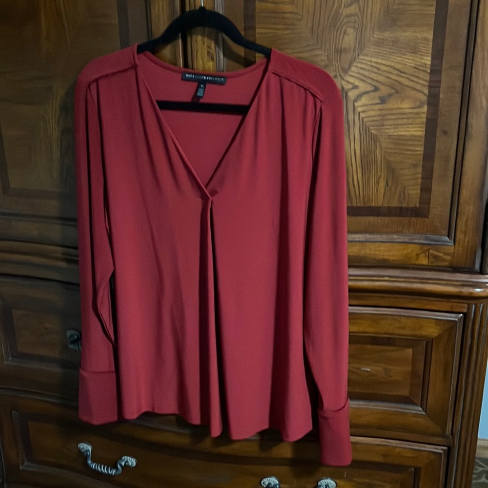 Burgundy silk like blouse.